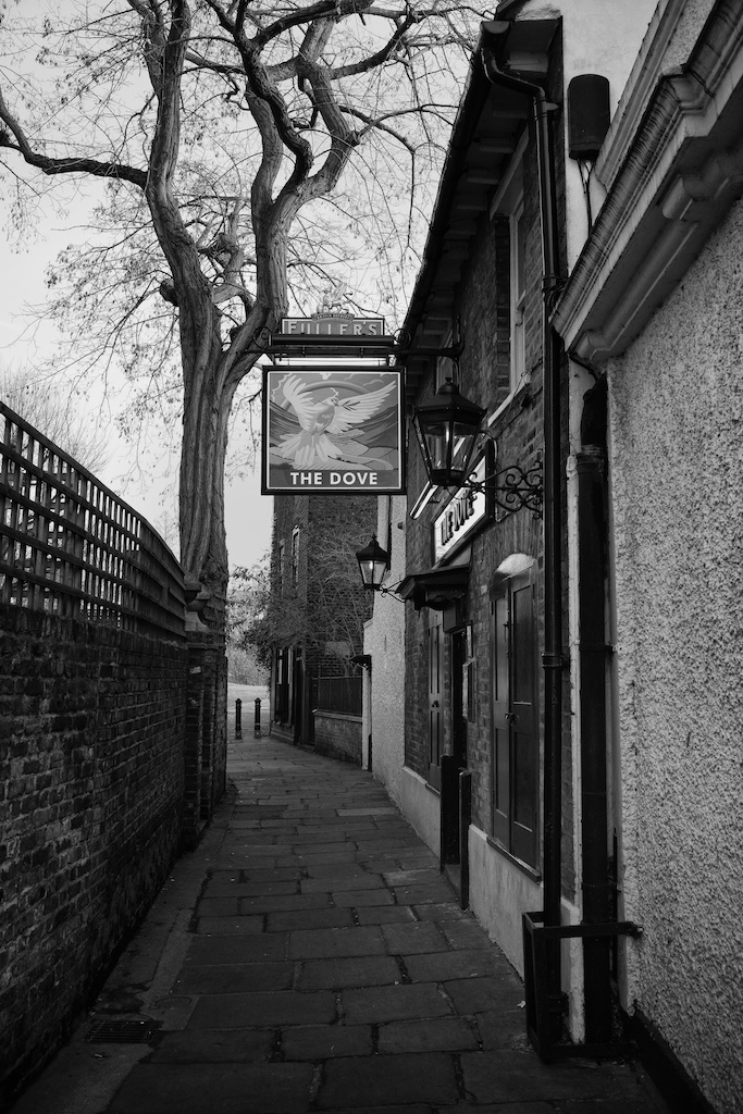 Above: The ancient Dove public house which gave its name to the Doves Press. Below: Commemorative plaque on the wall of the house which was used as a printing works