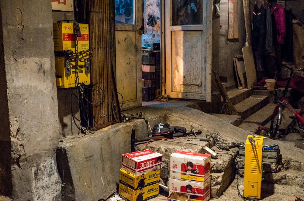 A dark corner of Beijing, the electric bicycle repair shop taken at 6400 ISO