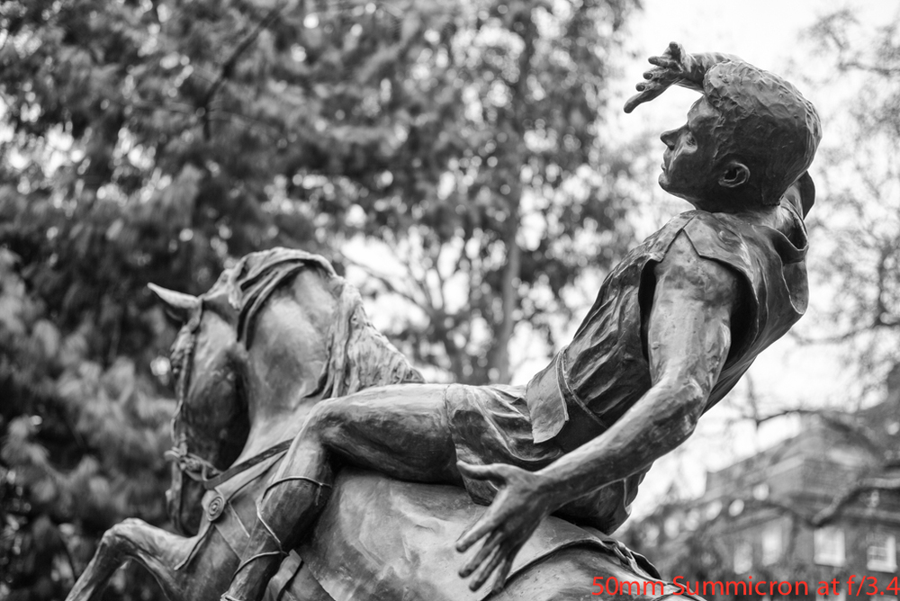 Out of curiosity I returned to Soho Square to reproduce this image of the conversion of St. Paul at a narrower aperture and with a different lens. This was taken at f/3.4 with a tiny 50mm Summicron attached to a Leica M. Both rider and horse are in focus this time and the background is subject to a small degree of bokeh. Which is more pleasing to the eye?