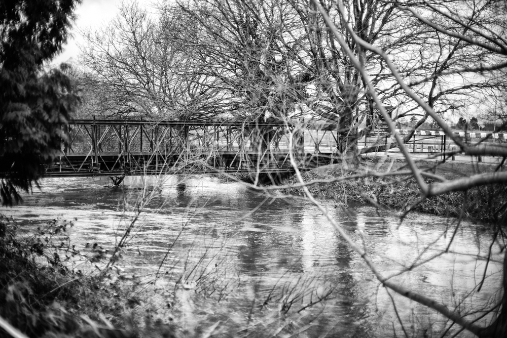   The River Wey is ready to burst its banks as it flows past the Brooklands Museum. Leica M, Noctilux at f/0.95 and ISO 200  