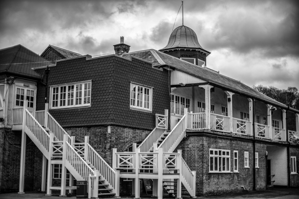   Storm clouds gather over the ancient club house at Brooklands. Leica M and 0.95 Noctilux at f/4  