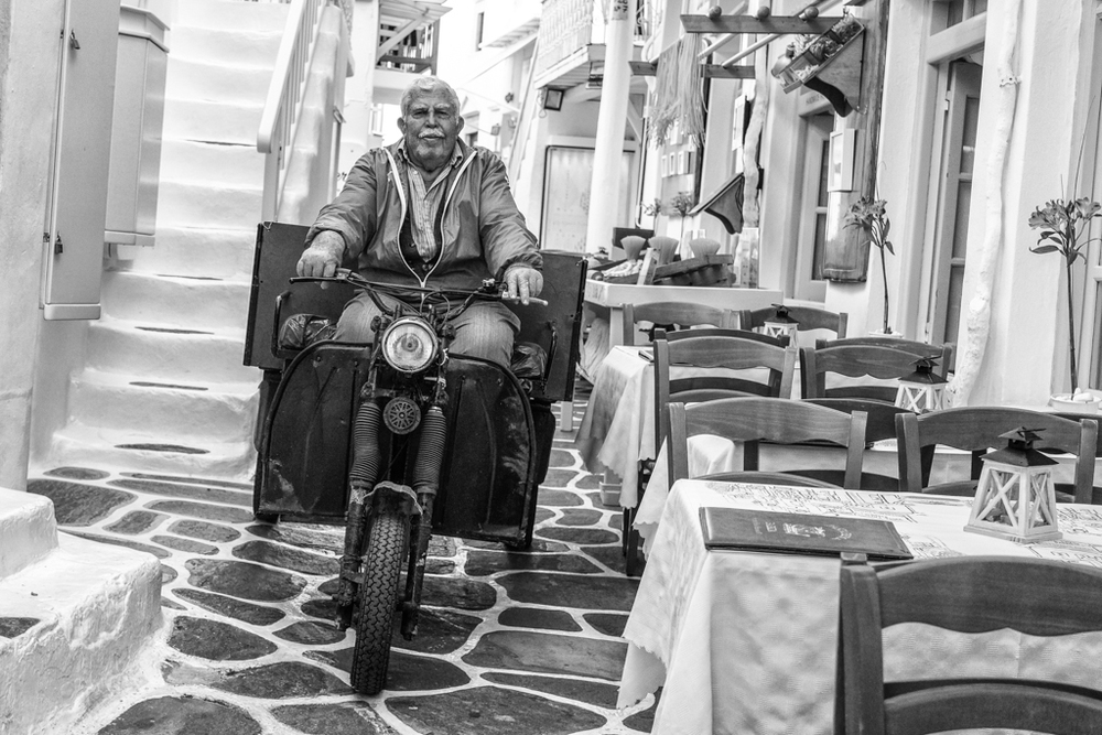   The narrow streets of Mykonos town are closed to all traffic except the odd delivery moped and a weird and wonderful collection of ancient and modern three-wheeled delivery trucks. This is one of the old 
