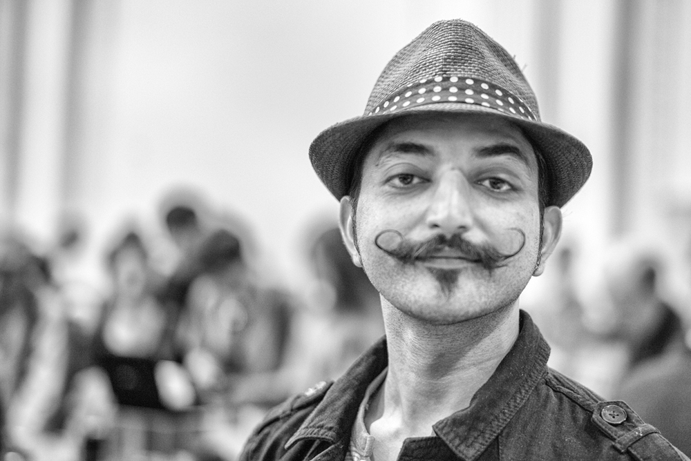   Vintage moustache to match the vintage camera.   