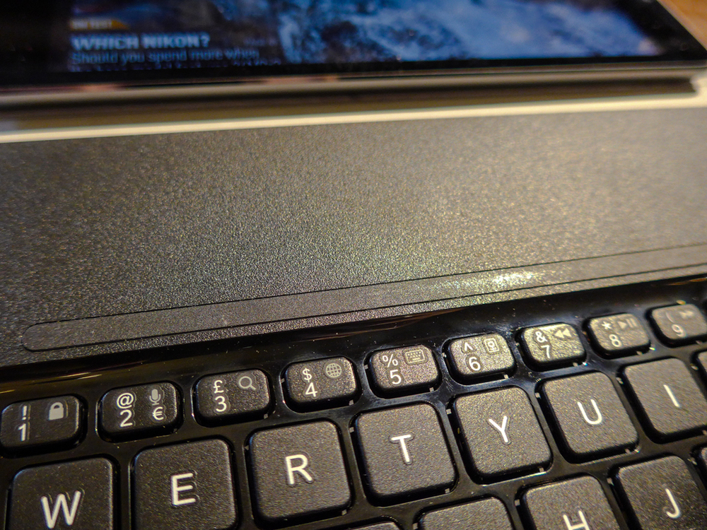 The slightly indented strip above the keyboard locks on to the iPad