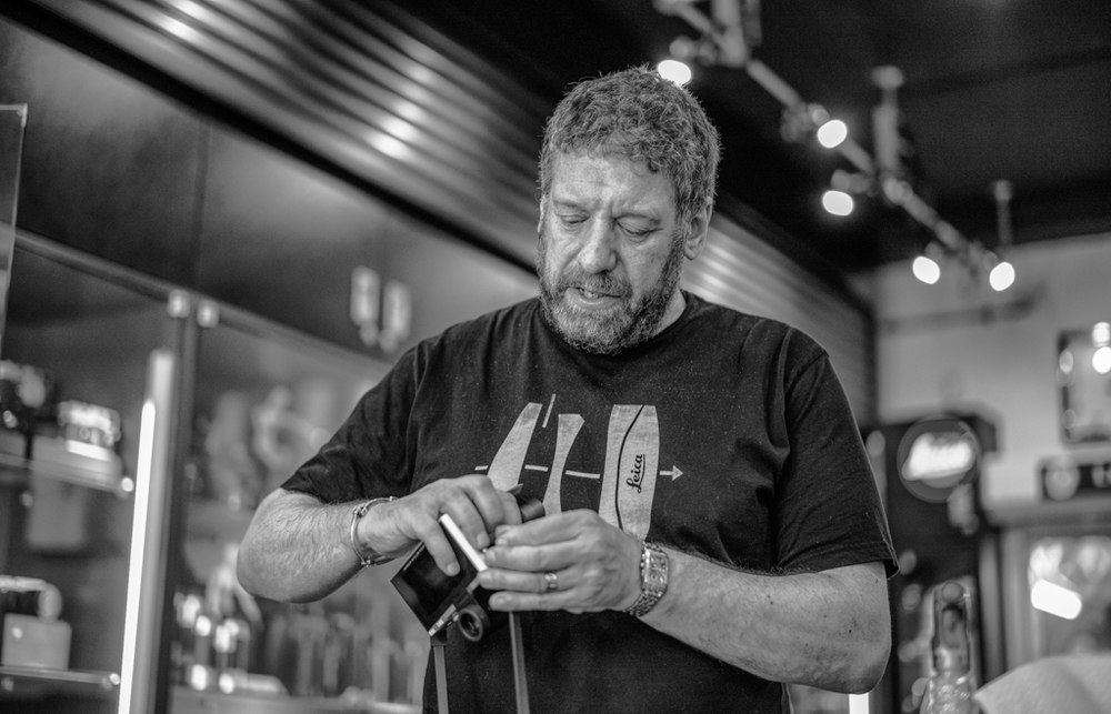 Ivor Cooper of Red Dot Cameras demonstrates how to fix the unique Leica T strap pillars. Since there was only one T to play with, this shot was taken with my Leica M and 50mm Summilux ASPH (at ISO 1250).