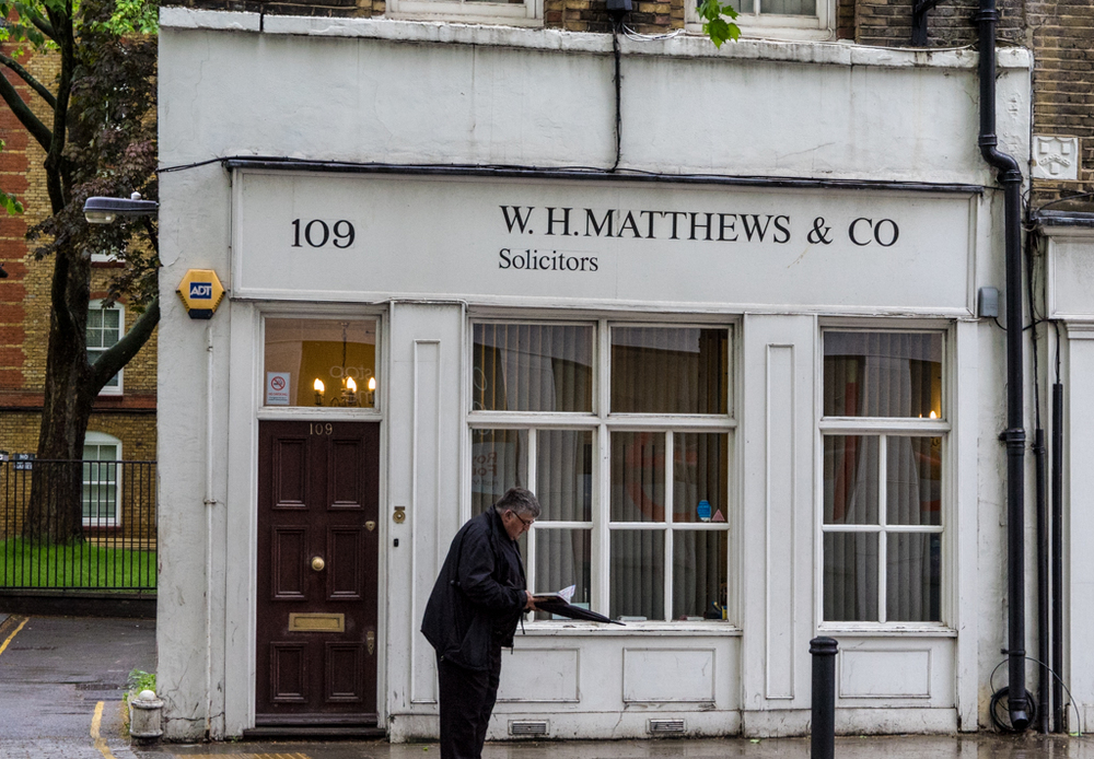 Wet and blustery day in Old Street—just the job for a bit of soliciting: 80mm view, f/5.6 at 1600 ISO Â
