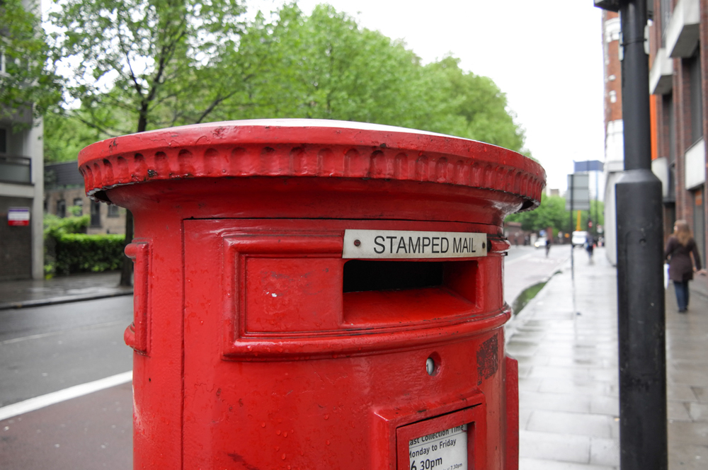 Mr. Postman: Leica Vario-Elmar-T at 27mm, f/3.5 (ISO 100)