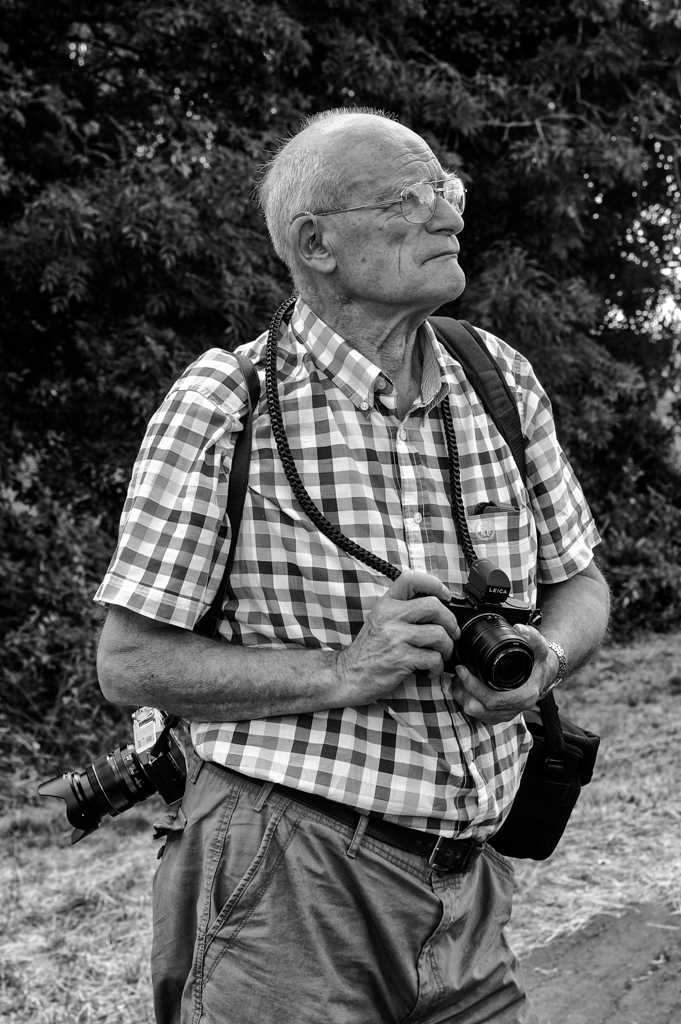   The maestro, festooned as usual and ready for action. Photo Mike Evans, Tri-Elmar at 35mm  