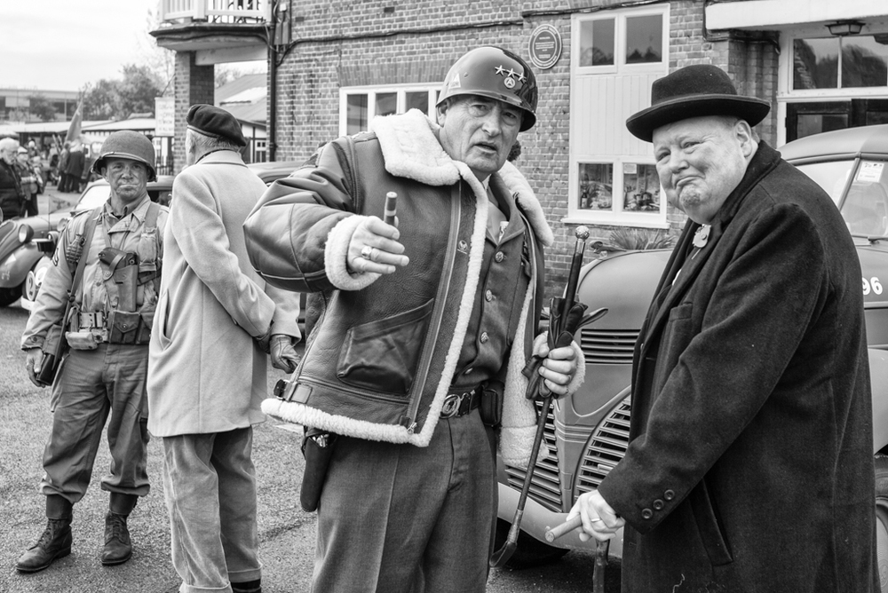 Cigars at the ready for Winston and General Patton (or is it Bradley?) with Field Marshal Montgomery addressing the hoi polloi in the background (Leica)