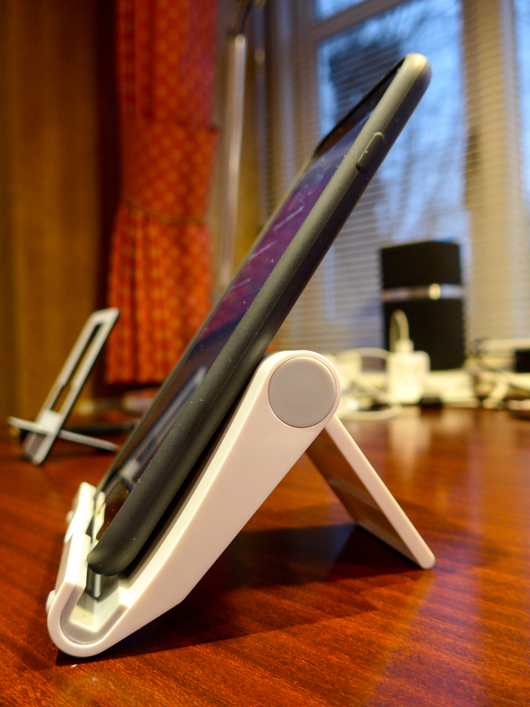 The VonHaus stand has a rubberised channel to hold the phone. However, it is too narrow when a case is fitted; instead, the phone rests on top of the channel. The propstand in infinitely adjustment and very secure