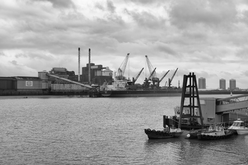 Sweet success: The sprawling Tate & Lyle complex on the opposite bank of the Thames once supplied almost all Britain