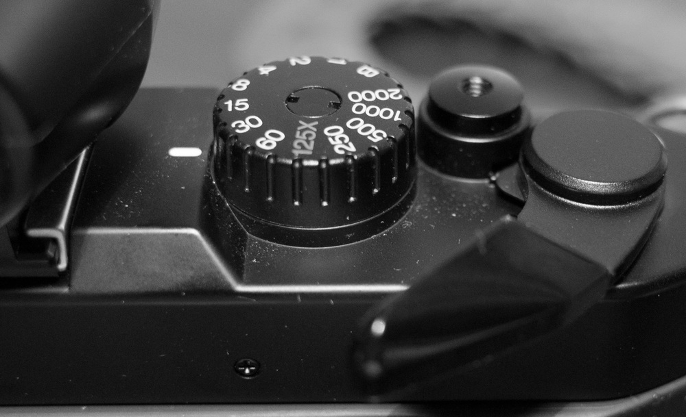 The film-advance lever must be pulled away from the camera body to switch on the electronics and allow the camera to fire