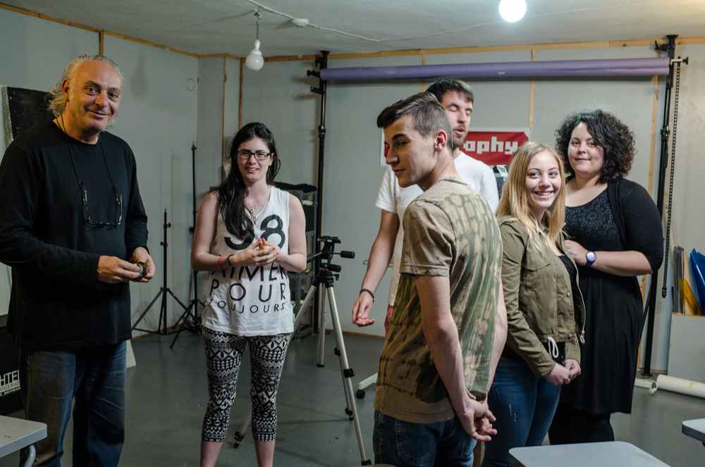 Dimitrios Tsevas in the academy studio with a group of keen students