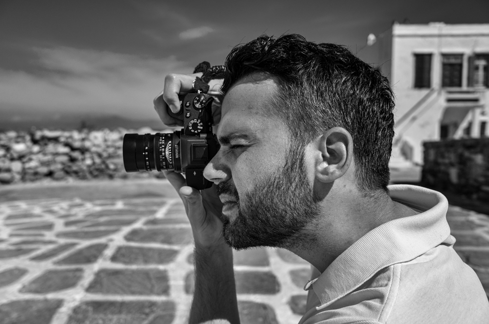 Kostas Tolias tries out my review camera, a Sony A7II with Leica 50mm Summilux ASPH