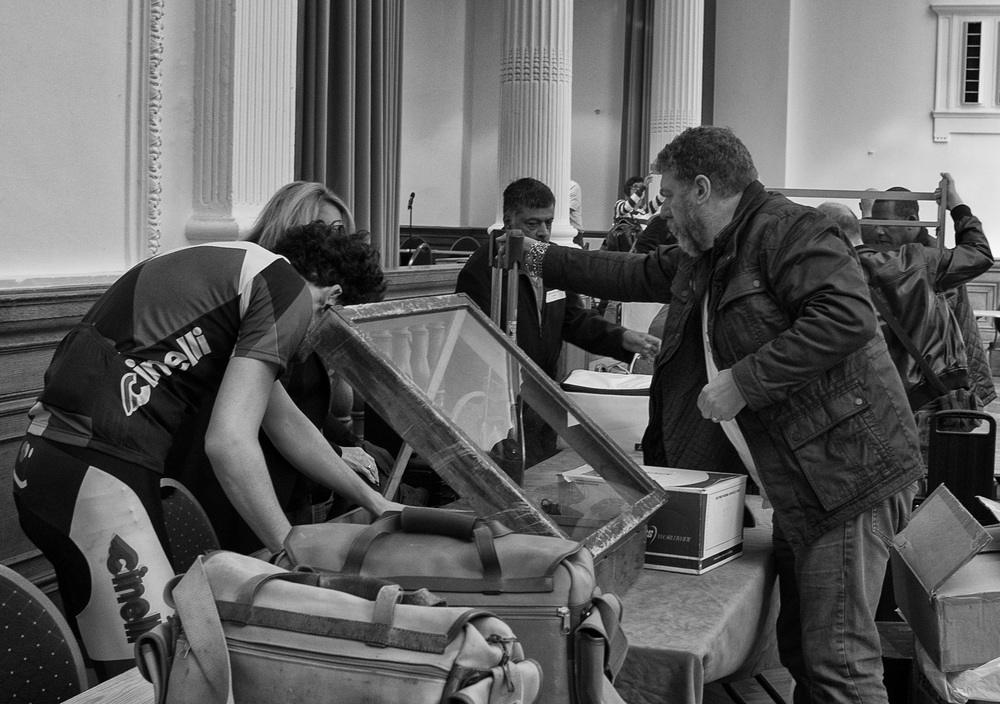 Ivor Cooper (right) and crew of London Leica dealer, Red Dot Cameras, setting out the stall at 8am