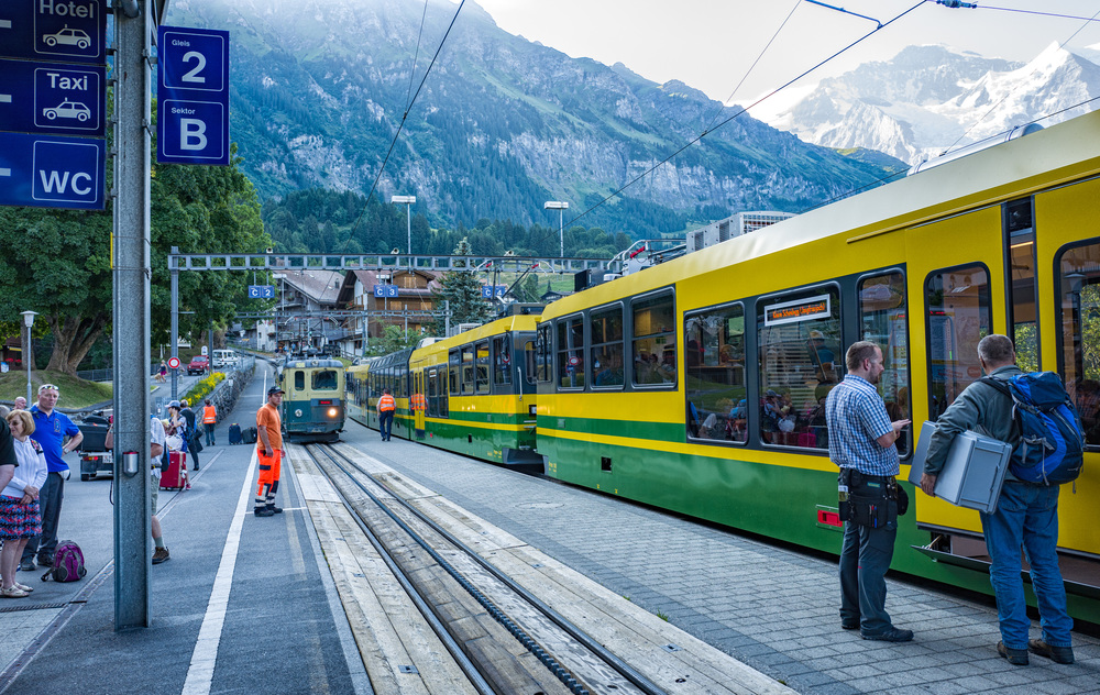 Busy Wengen station on the Wengernalpbahn at the start of the steep climb up to Kleine Scheidegg and the Eiger