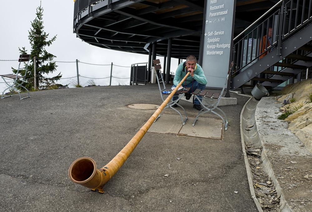 Blowing the alpenhorn at the top of Schynige Platte
