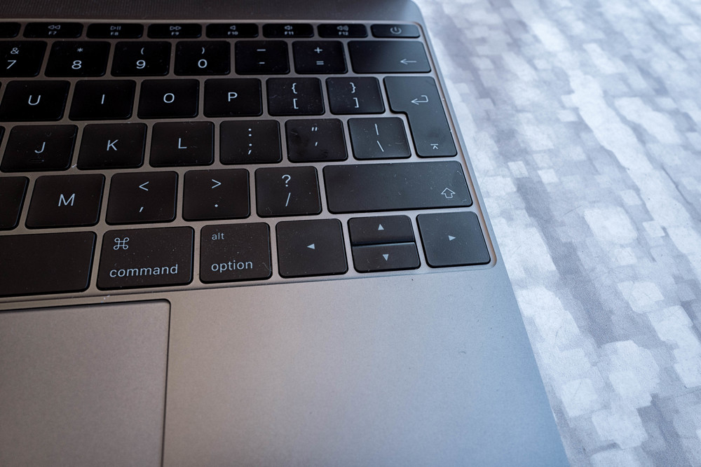 Above: Direction arrow keys are redesigned with left and right occupying individual keys up and down combined in one rocker key