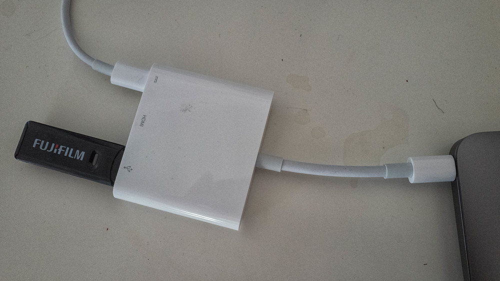 USB-C Digital Adapter with inputs for USB-C (power) HDMI and USB-3 (here with an SD card reader)