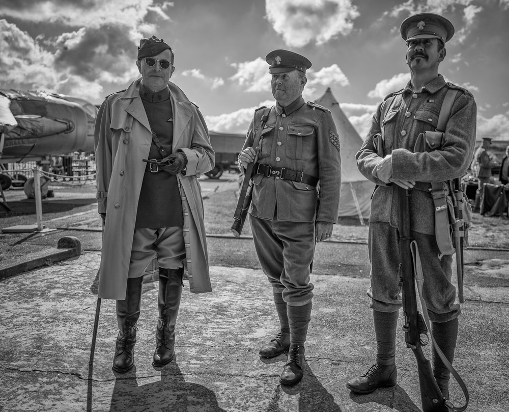 Officer and a gentleman with two of the hoi polloi