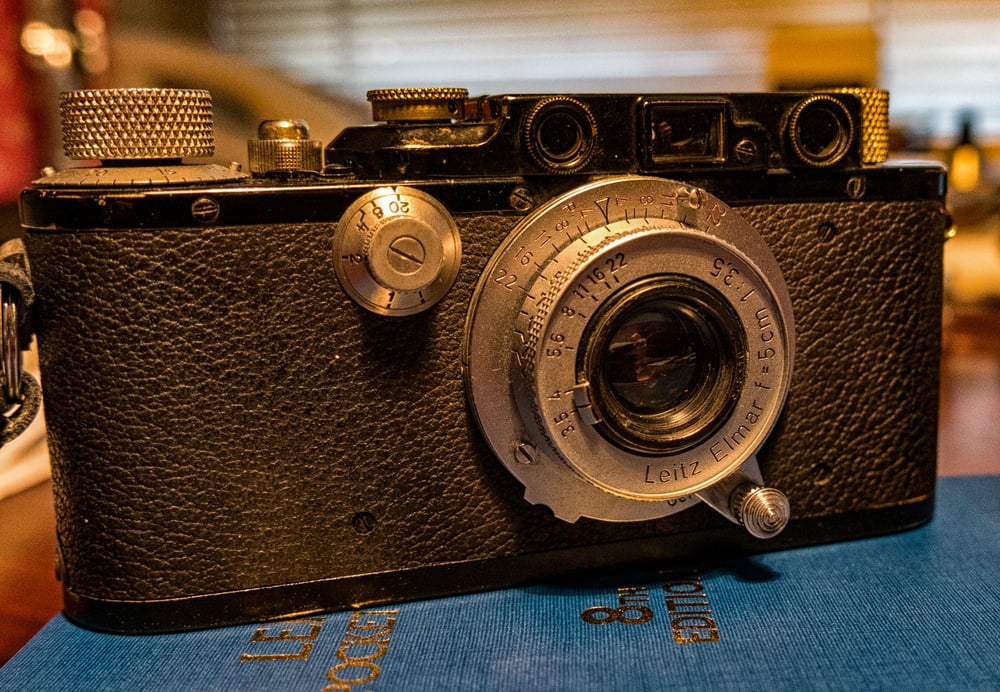 Black versions, originally a cheaper option than chrome in the 1930s, are now more popular and command a premium. Note the tiny f/3.5 50mm Elmar collapsible lens.