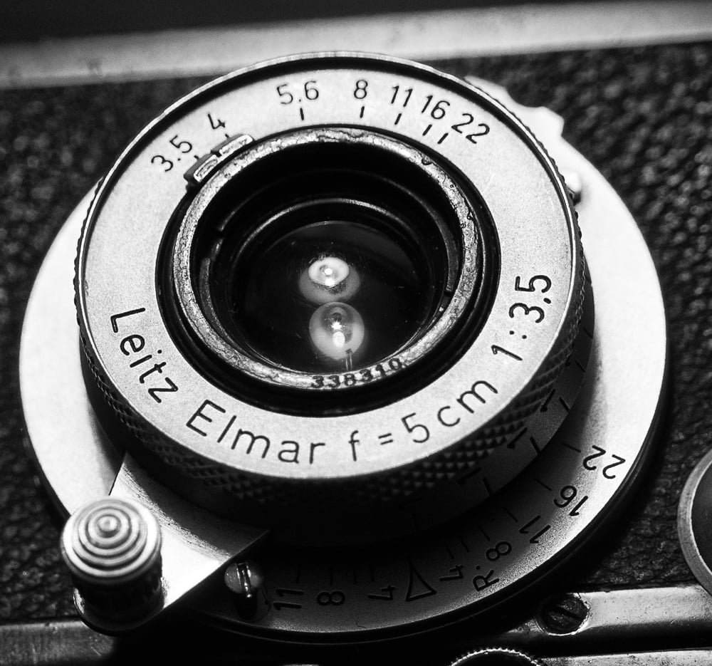 Could this be a later lens with some components from a much earlier 1936 lens, including the early serial number 338210? Perhaps I have a Frankenelmar.