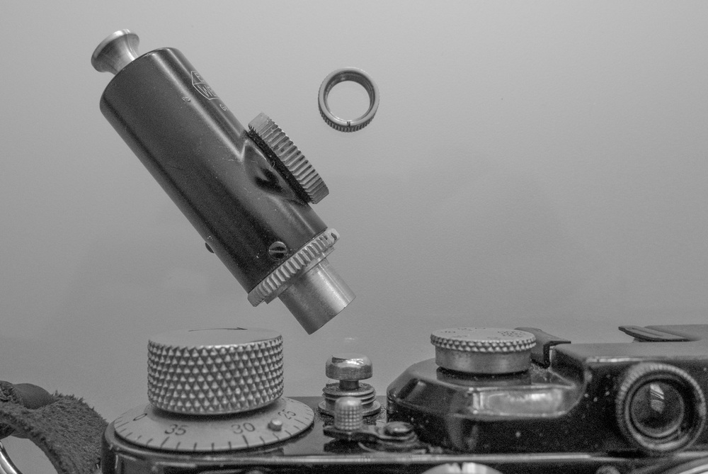 My 1935 Leica III has a smaller shutter release collar which has to be unscrewed before the APDOO can be mounted. That