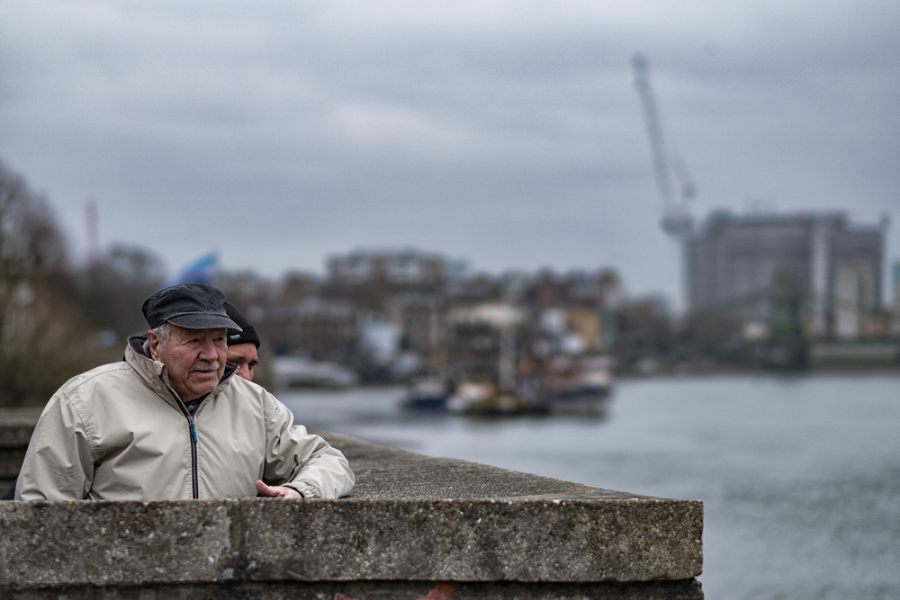 Above: Senior members of the London Corinthians Sailing Club keep an eye on the Boat Race practice from the club