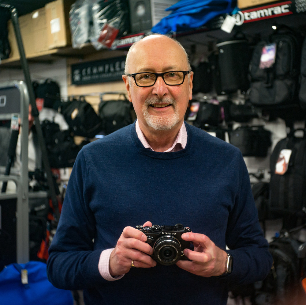 Indoors at ISO 2000 with the Leica M and the 1935 Elmar: Author Mike Evans with the new Olympus Pen. Photo Andy Sands, Chiswick Camera Centre