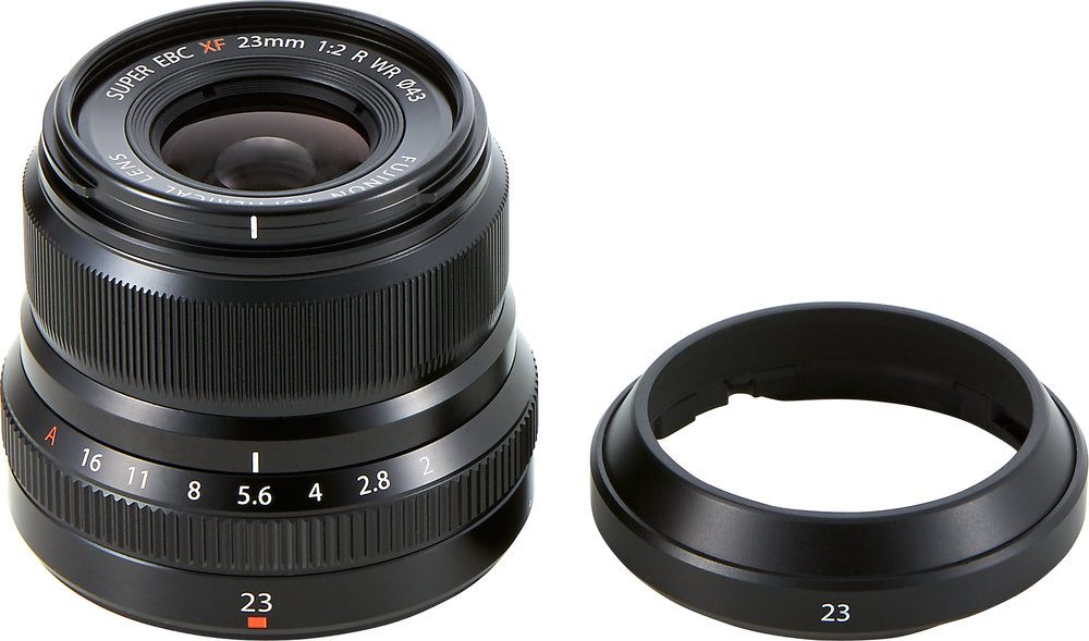 The new, compact and lightweight lens brings a 35mm-equivalent street lens to the lineup without straining the camera bag. It is available in black or silver and comes with this neat hood
