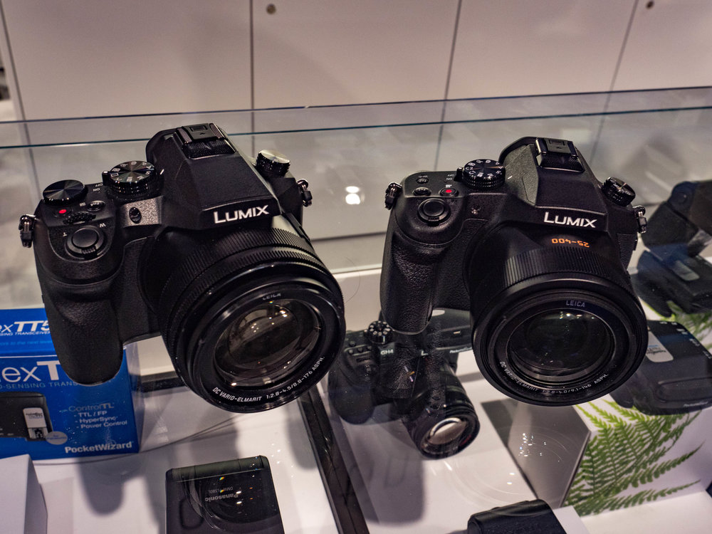 The FZ2000 on the left is very similar in form to the existing FZ1000 (also the Leica V-Lux). The 1000 has the lens aperture range visible on top of the lens when retracted. On the 2000, the lens markings appear only when the lens is extended. This is the quickest way to tell the two models apart.