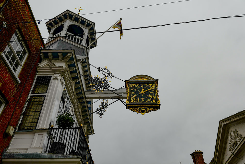Where would Guildford be without the High Street clock? But someone with clout should chop down those cables (Leica SL)