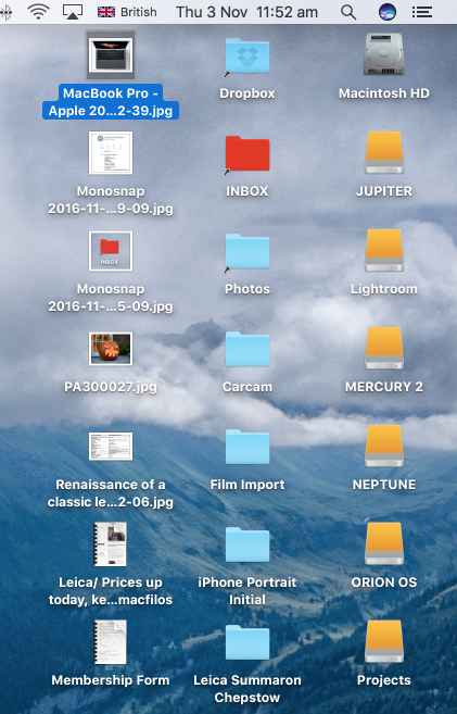 A snap of a small portion of the desktop on my office iMac. Alias folders, with the bottom left corner arrow refer to actual folders on the drive. Photographs, screen shots and other reference material are temporary but often needed for work in progress when travelling. The mounted drives (yellow) are represent backups and photo libraries.