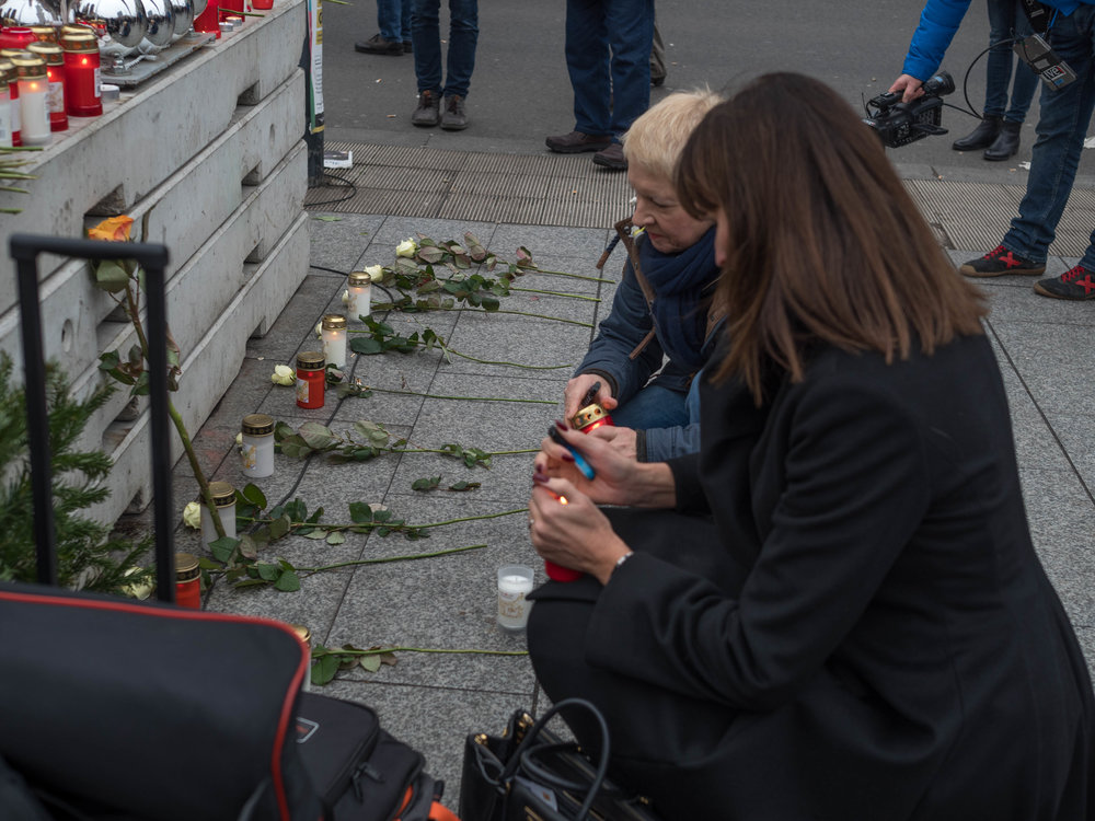 Another atrocity, another memorial of candles and flowers