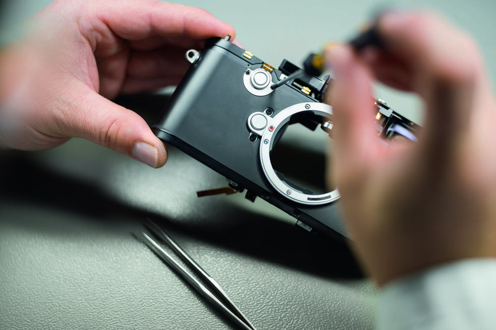 Installing the protection cover of the override button on the main body