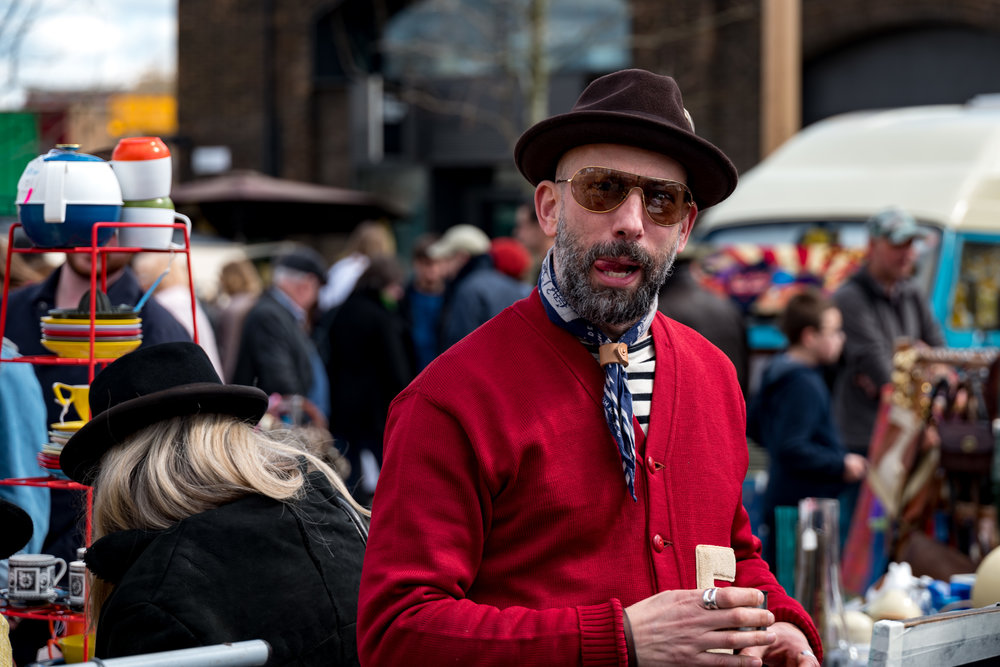 I always knew the SL with the 24-90 Vario-Elmarit zoom was a great event camera — here it is at a summer market. Now I know I can use it with confidence in the worst of conditions while keeping my hands warm.