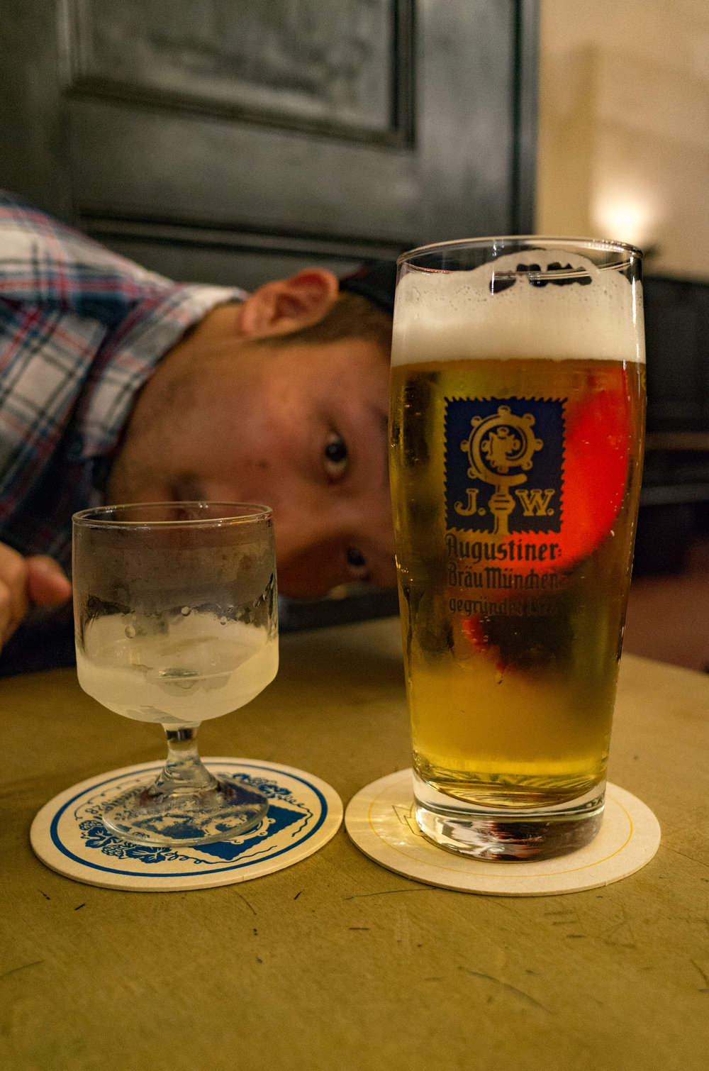 Having to check in expensive photographic gear will force us to take a long, hard look at the size and value of our travel equipment. A small, relatively inexpensive compact such as the Ricoh (used here in a Munich beer garden) will be high on the list of alternatives to costly systems