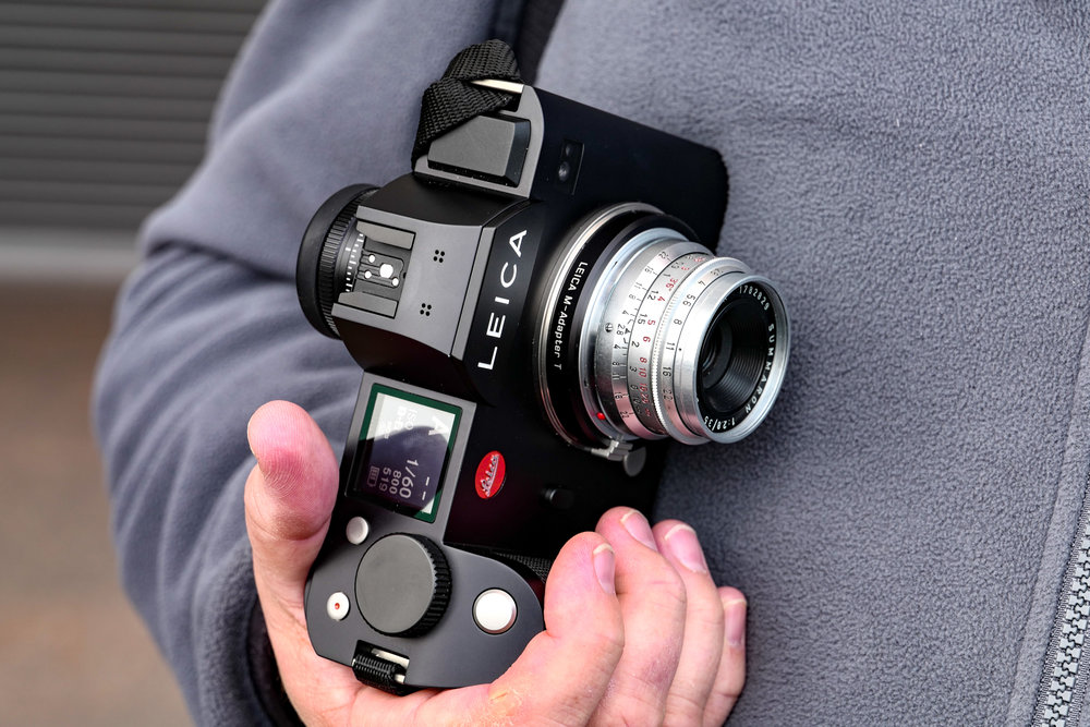The SL works reliably with almost all M lenses — it