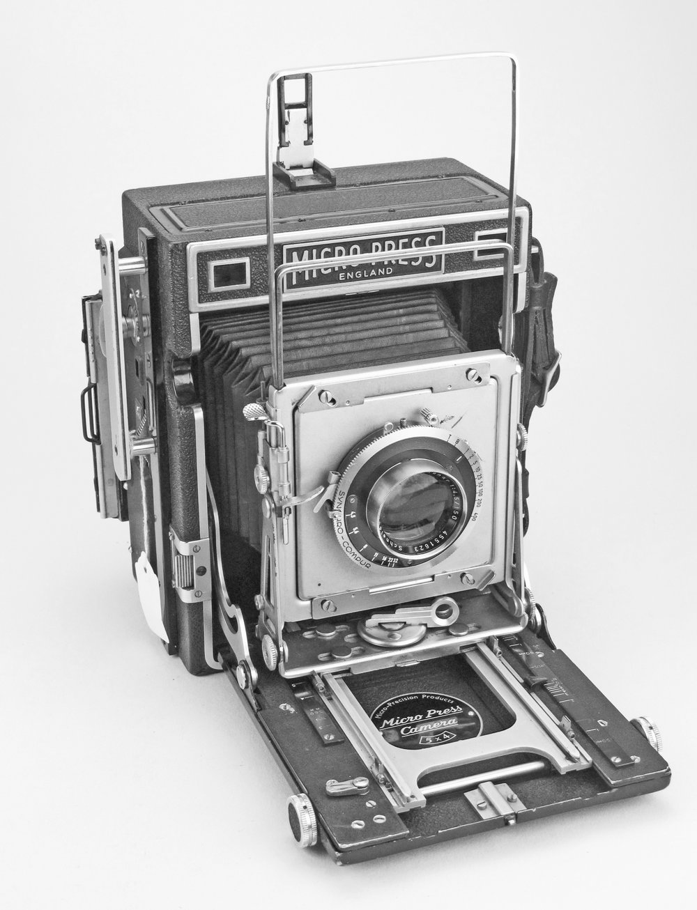   [Fig.13] MPP Micropress Camera with Xenar f/4.5 150mm lens and spring back for 5x4 plates, introduced in 1951.  