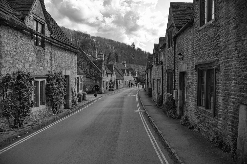 Above: Castle Combe claims to be the prettiest village in England, preserved from the motor car by the double yellow line. Below: Centre of the village, not a car in sight. Who needs Disneyworld when this is on your doorstep?