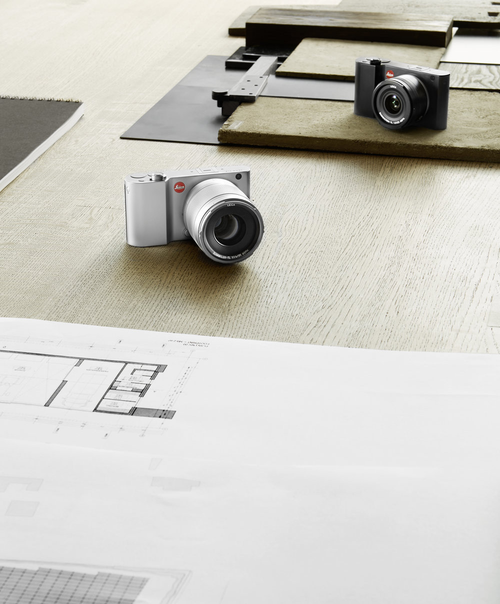 Could there be a new beast on the stocks, perhaps a more traditional APSC system camera with built-in viewfinder? Perhaps, even, an SL Mini?