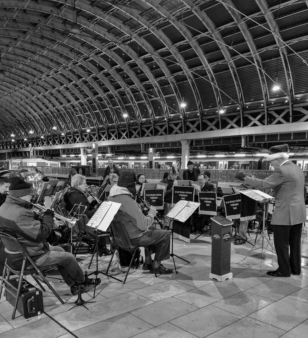   Mike Evans was surprised to find that the new iPhone X froze the movements of the Paddington Station Band even at a leisurely 1/6s and f/1.8. (B&W conversion in Silver Efex Pro)  