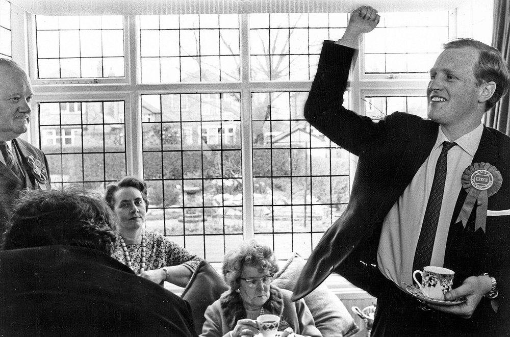   Tea and, possibly, crumpets as Winston Junior celebrates suburban conservatism during a local election in Flixton West, south Manchester in the early 1970s (image Don Morley)  