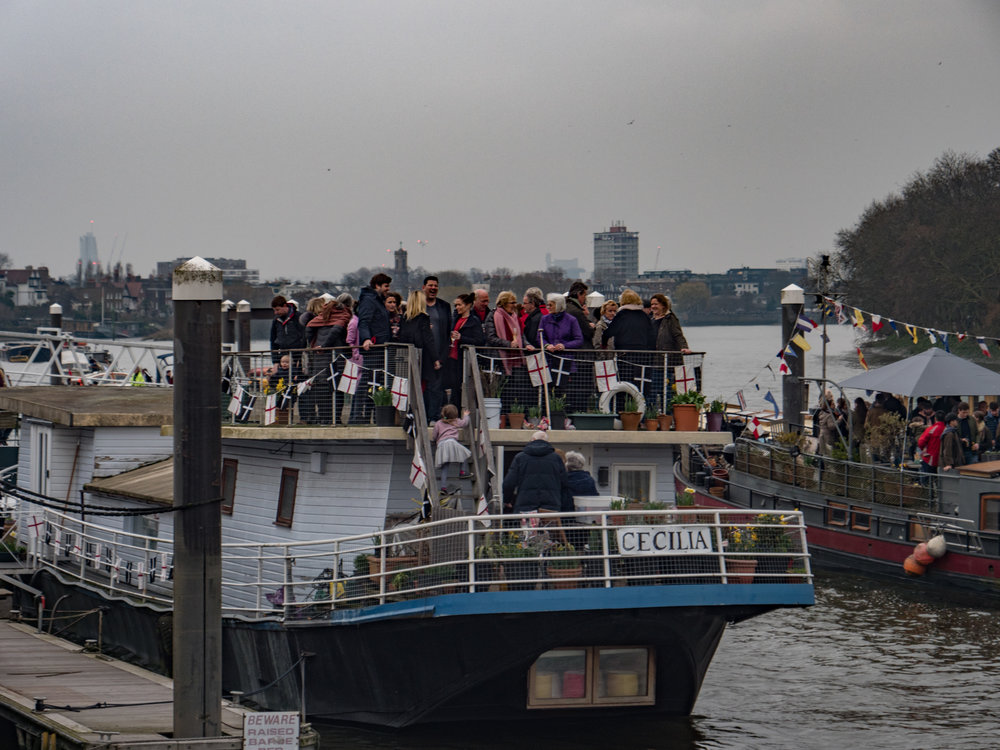 Anticipation: The owners of all the house boats along the route invite every known friend and relative to sample the dull day