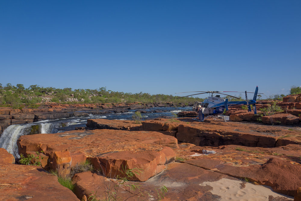 Landing by helicopter on top of the King George Falls