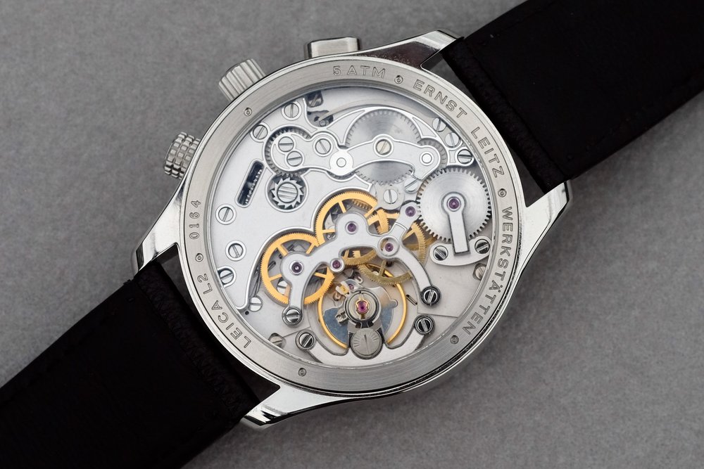 The caliber are made for Leica by Lehmann Präzision and are an exclusive design. Finishing is nice, if on the industrial side of things stylistically, according to Stephen Pulvirent