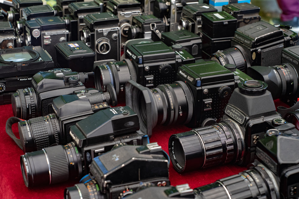 Serried ranks of elderly cameras everywhere