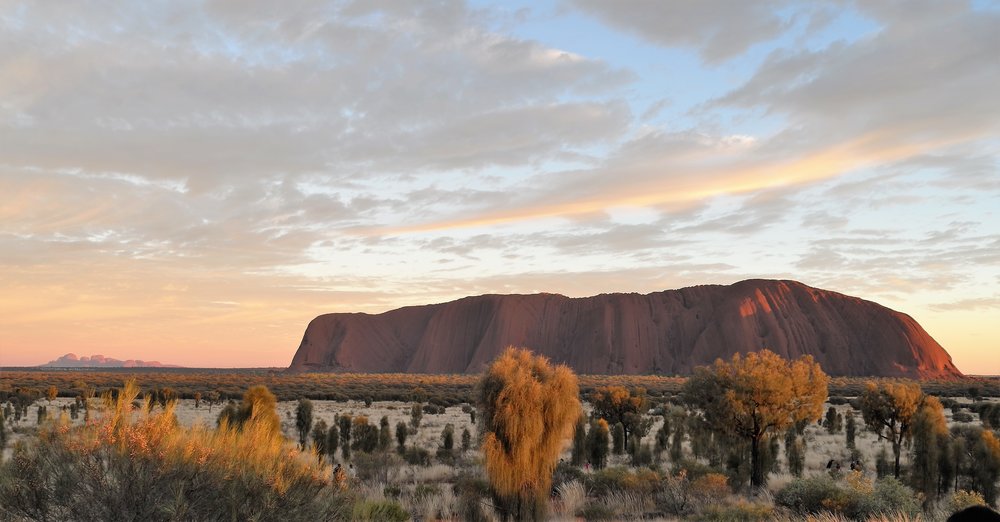   Yes it’s the Rock at dawn. Every tourist captures this image. Each one a little different as the light changes.  