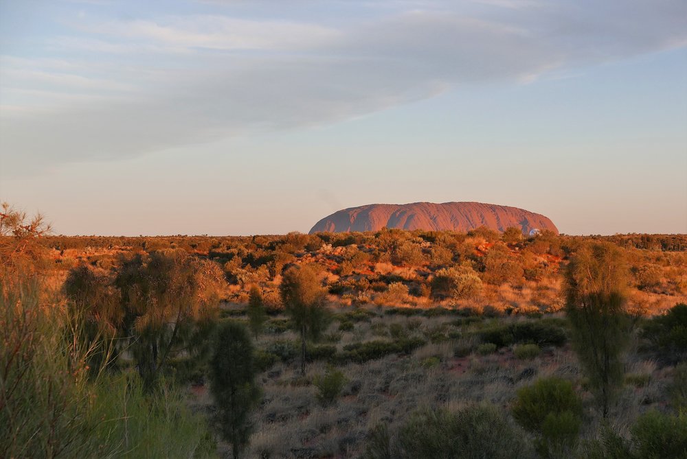   Uluru changes colour dramatically at sunset — just before....  