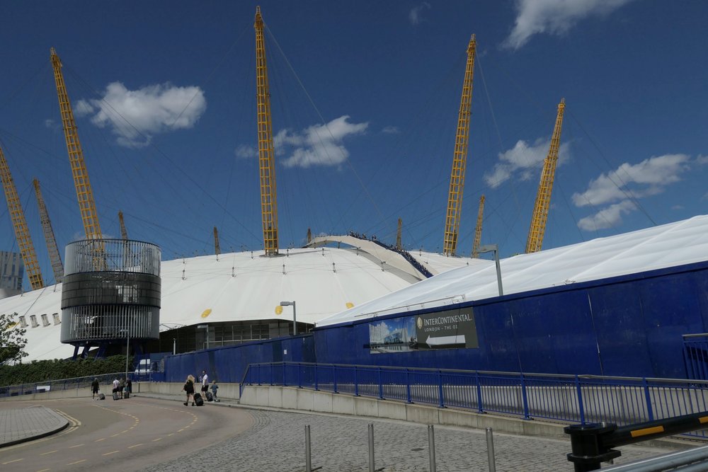 The O2 dome at Greenwich taken at 24mm. Note what appears to be a fin, centre top. Below: At 360mm all is clear — the hardy tourists, with clearly visible harnesses, making their way to the summit